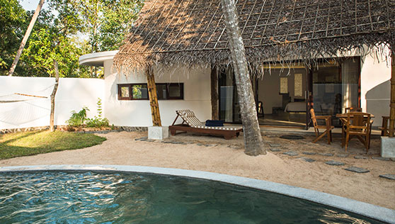 Pool cottage with sun bed and hammock beach resort